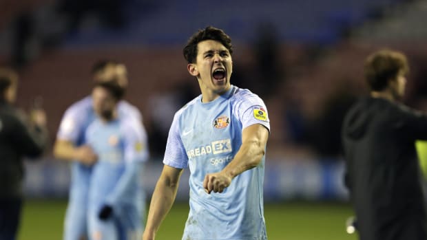 Luke O'Nien celebrates at Wigan